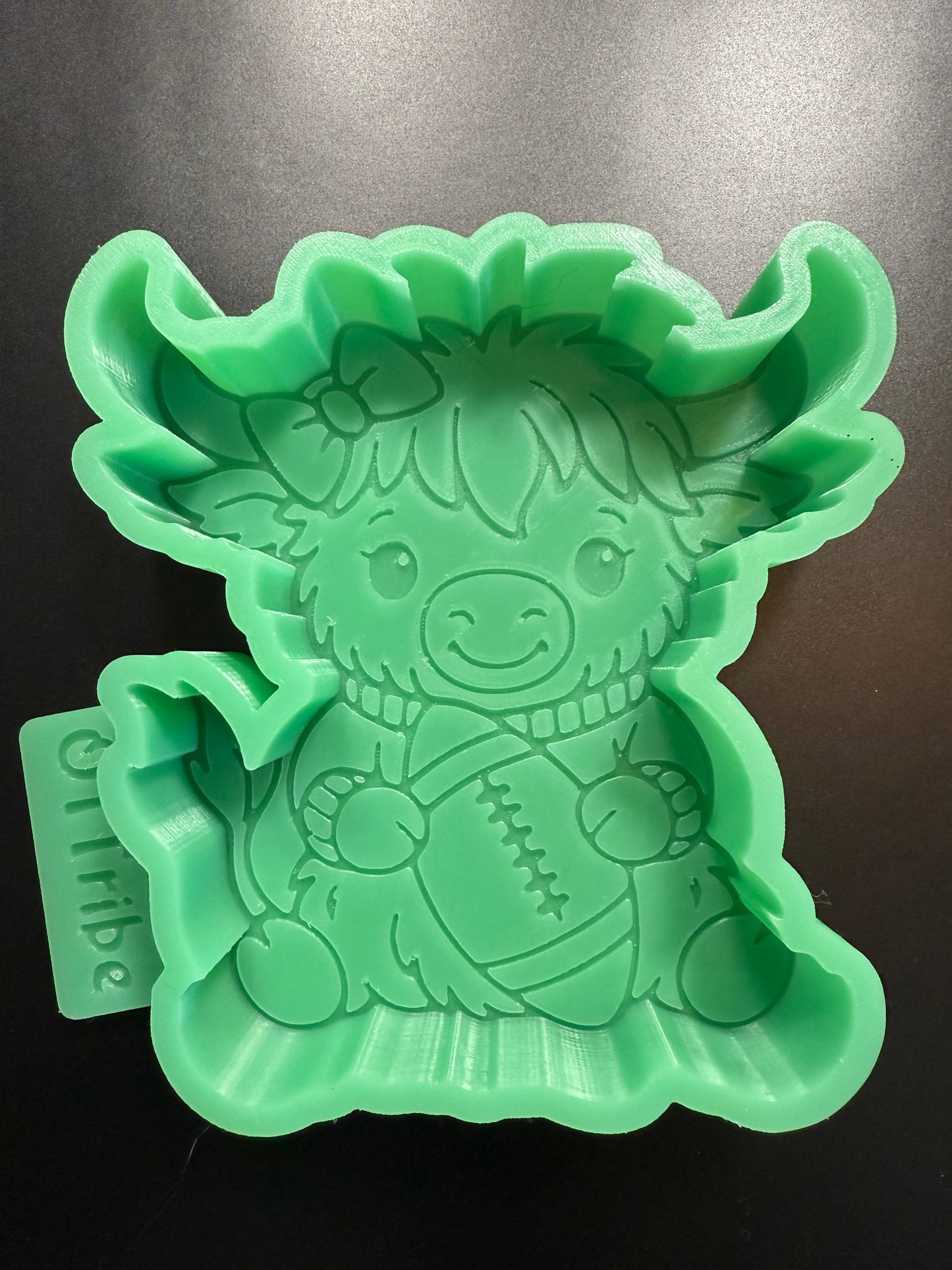 Highland with football